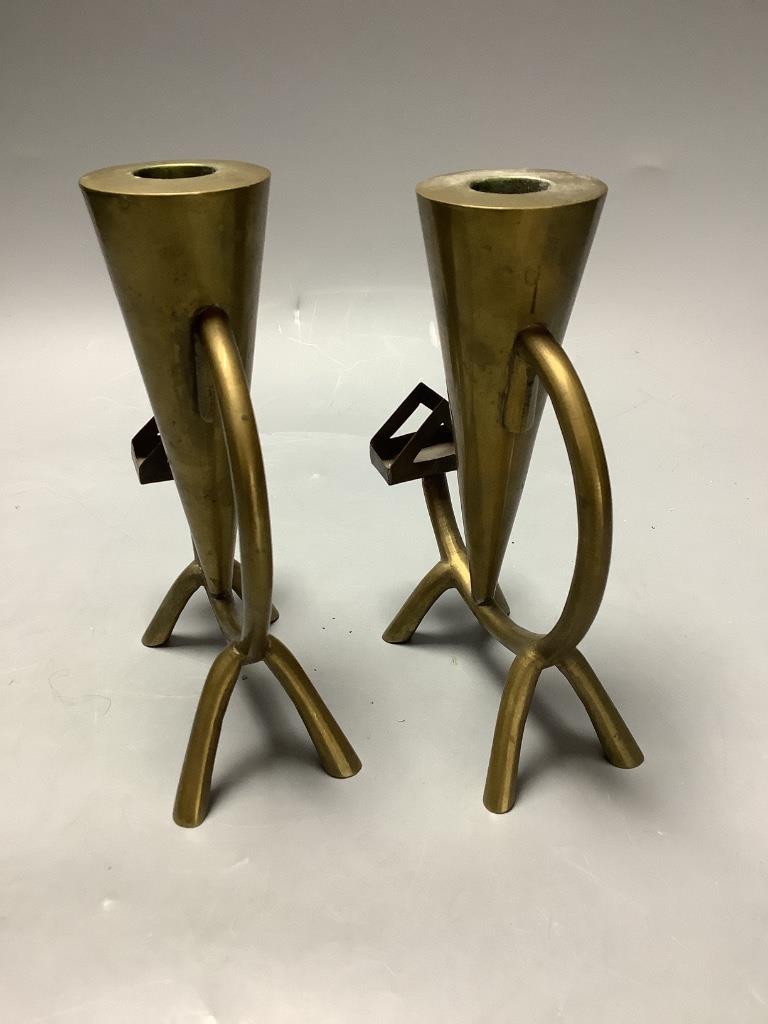 A pair of mid century brass 'cat' candlesticks, height 16.5cm